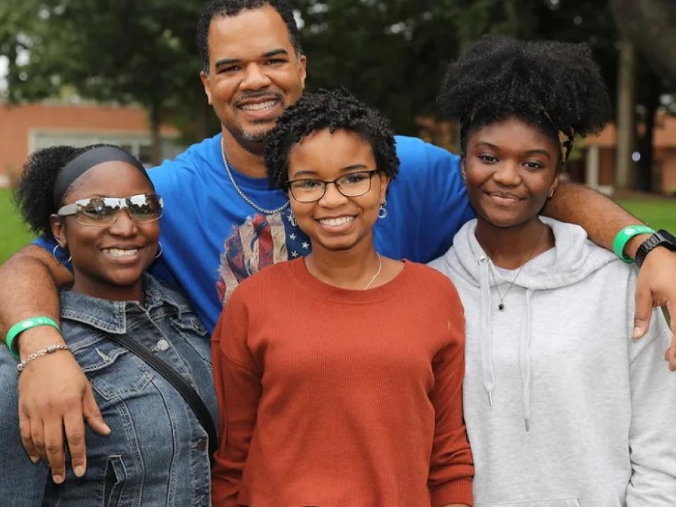 A family attending Fall Fest.