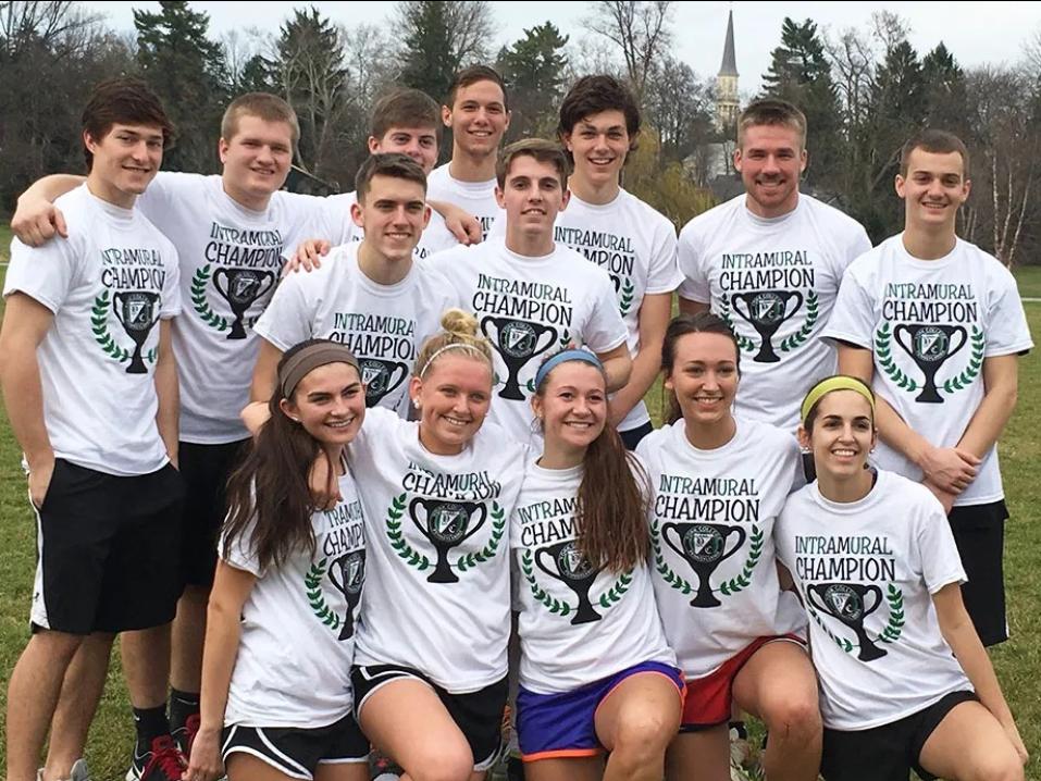 An intramural team in their matching t-shirts after winning the game.