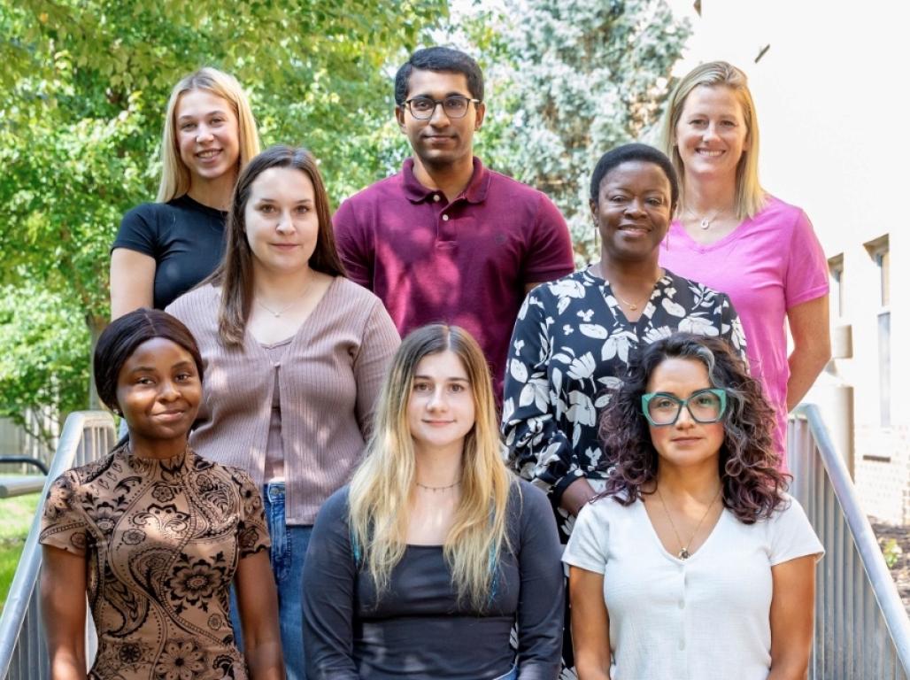 The first cohort of the Thornton Accelerated Bachelor of Science in Nursing. The students are grouped together on a short staircase.