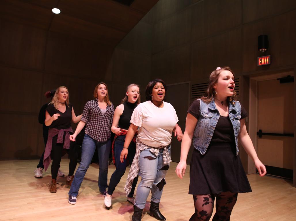 Theatre students rehearsing for a play