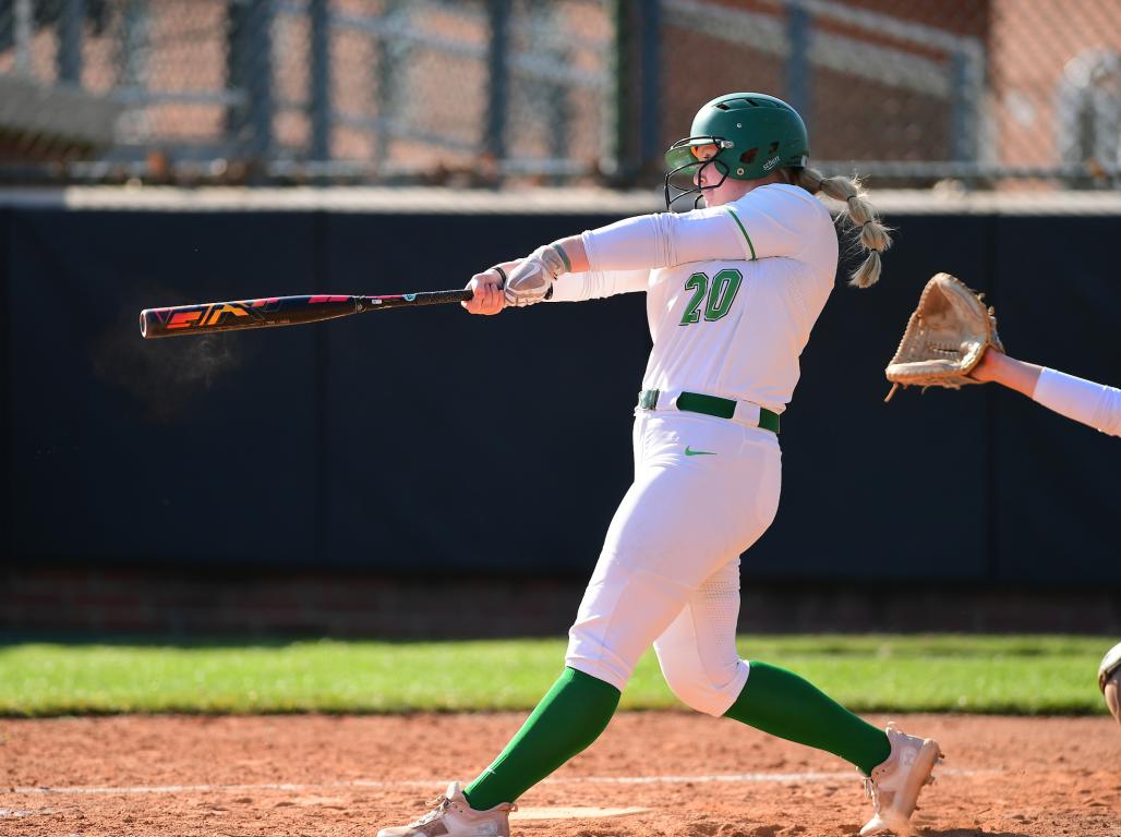 Emma Wade at bat, swinging.