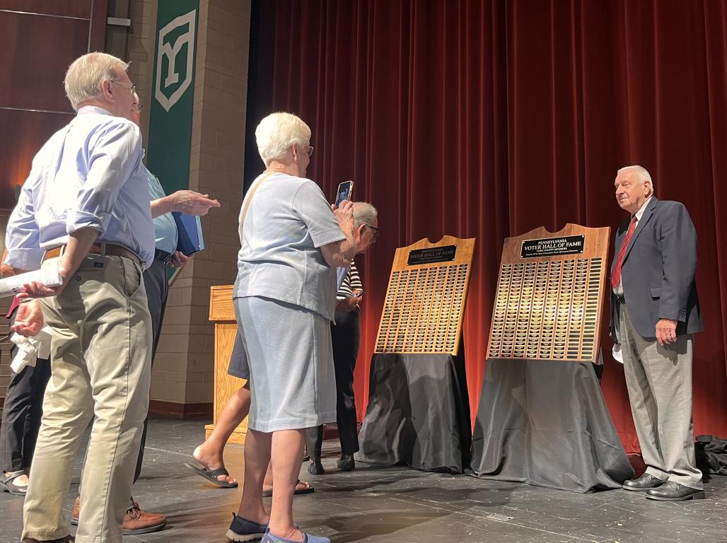 Members of the PA Voter Hall of Fame have their photo taken on stage at the WPAC
