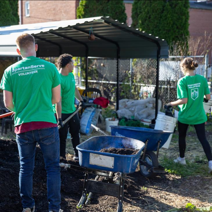 Student volunteering for SpartanServe.