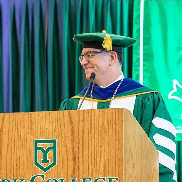 The President giving a speech at his Inauguration behind a podium.