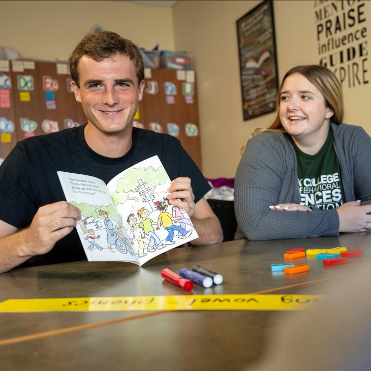 Two education students in the reading literacy lab.