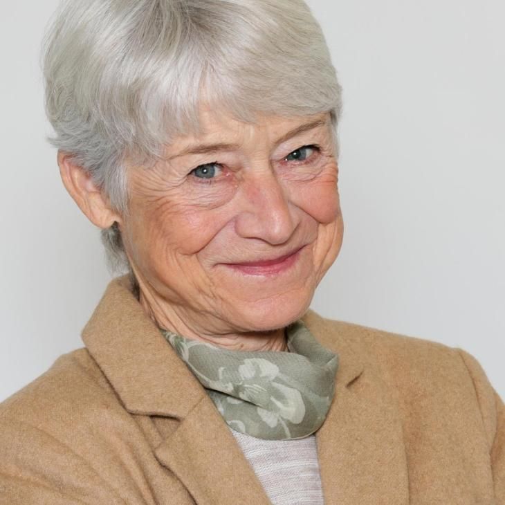 Photograph of Urban Collaborative funder Lisa Fast in front of a white background.